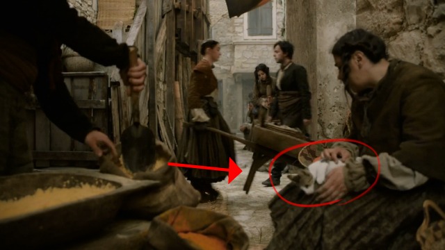 Game of Thrones - Hardhome - kitten in woman's lap in foreground