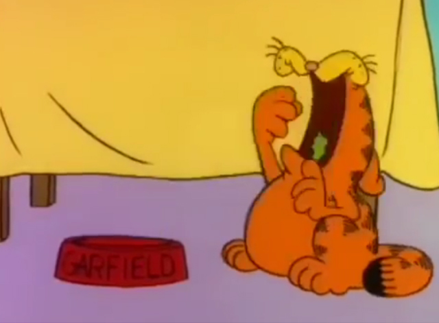 Garfield's Thanksgiving - Garfield eating half of a lettuce leaf