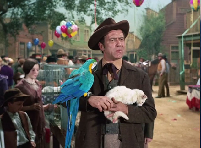 Gunsmoke - A Man Called Smith - Burke Ted Jordan holding parrot and dirty white cat