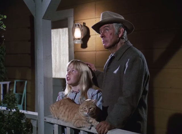 Gunsmoke - Milligan - Johnny Harry Morgan and Wendy Patti Cohoon standing on porch with ginger tabby cat Jim Grim