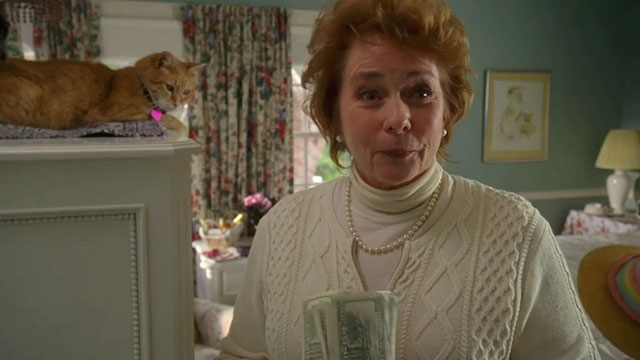 House, M.D. - Airborne - Fran Jenny O'Hara in bedroom with ginger and white tabby cat Harrington on dresser