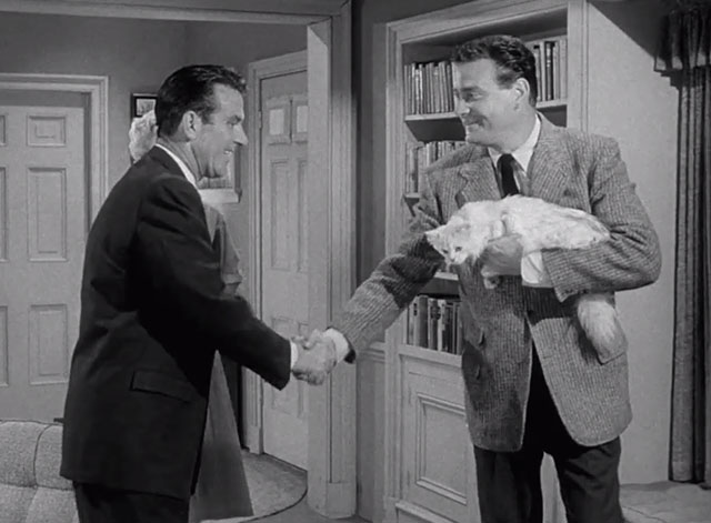 Leave it to Beaver - Cat Out of the Bag - Ward Cleaver Hugh Beaumont shaking hands with Mr. Donaldson Ray Kellogg holding white Persian cat Puff Puff