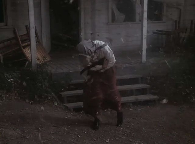 Little House on the Prairie - Days of Sunshine, Days of Shadows Part Two - Laura holding black cat while pushing through storm