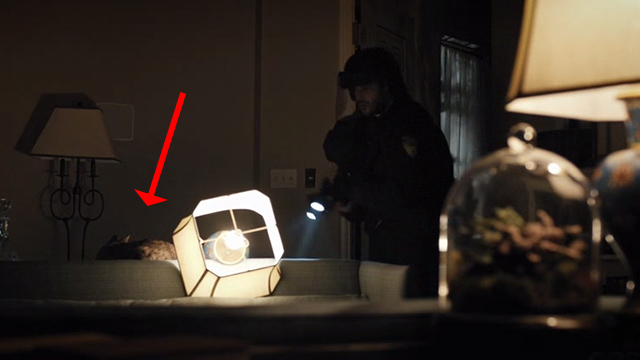 Madame Secretary - Extraordinary Hazard - tabby cat on table as SWAT team member enters