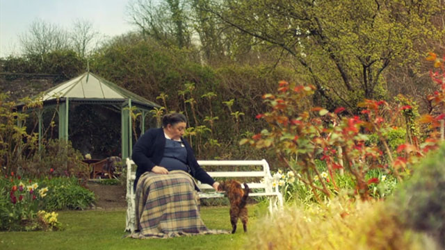 Malory Towers - The Lost Treasure - Matron Ashley McGuire feeding kippers to torbie cat Kenny