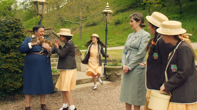 Malory Towers - The Lost Treasure - Matron Ashley McGuire holding torbie cat Kenny with Ellen Carys John and Jean Beth Bradfield