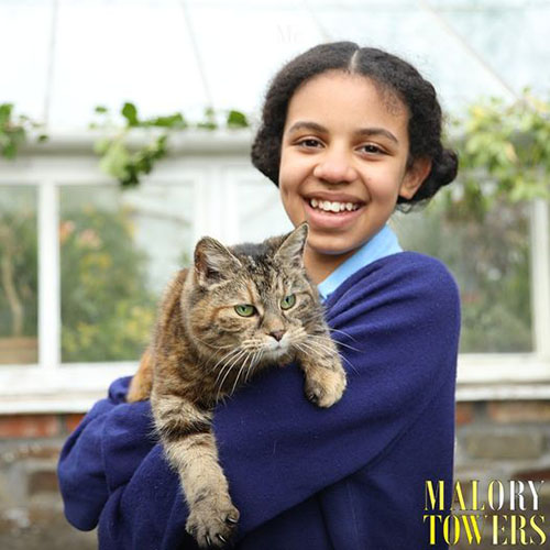 Malory Towers - publicity shot with Ellen Carys and torbie cat Kenny