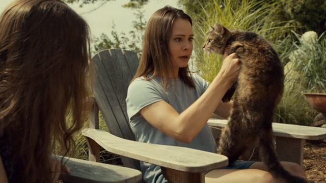 Mary Kills People - Morning Glory - Jess Abigail Winter holding up tabby cat Casper
