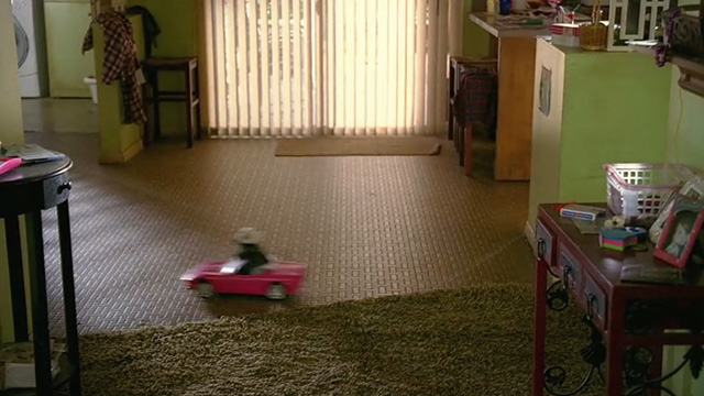 The Middle - From Orson with Love - kitten in toy convertible car racing across living room