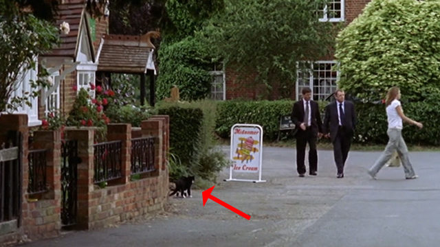 Midsomer Murders - The Animal Within - Barnaby John Nettles and Jones Jason Hughes walking past tuxedo cat