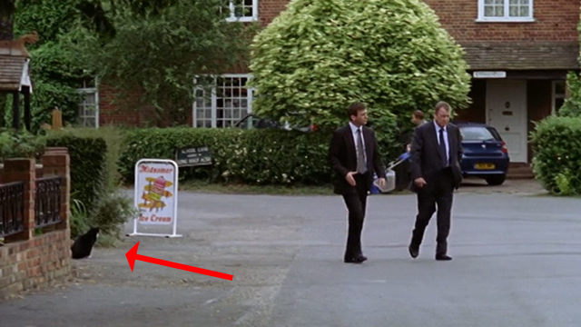 Midsomer Murders - The Animal Within - Barnaby John Nettles and Jones Jason Hughes walking past tuxedo cat