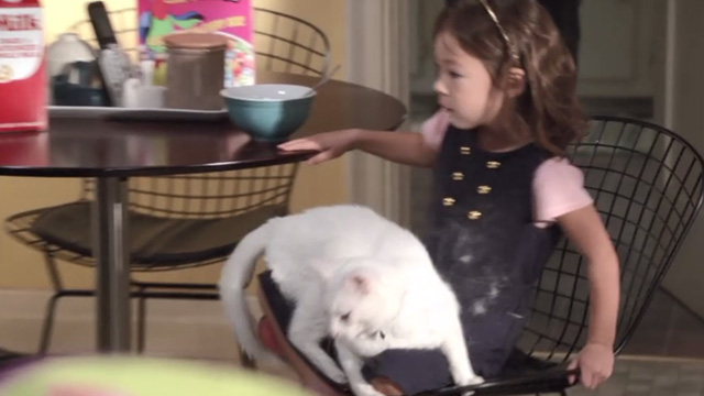 Modern Family - Snip - Larry Frosty cat jumping down from Lily Aubrey Anderson-Emmons lap