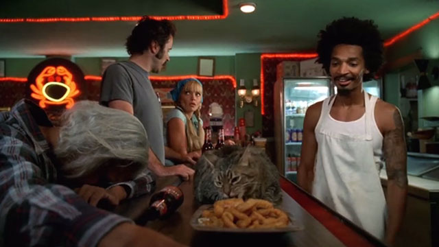 My Name is Earl - Larceny of a Kitty Cat - Darnell Eddie Steeples looking at heavy Bengal tabby cat Sebastian eating onion rings on bar