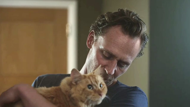 The Night Manager - Season 2, Episode 1 - Alex Jonathan Tom Hiddleston holding longhair ginger tabby cat Corky
