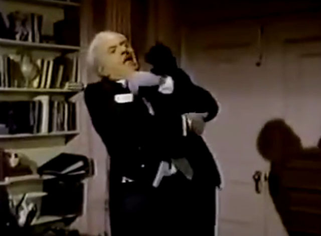 The Nutt House - Pilot - Reginald Harvey Korman awkwardly holding black cat