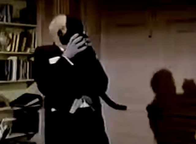 The Nutt House - Pilot - Reginald Harvey Korman awkwardly holding black cat