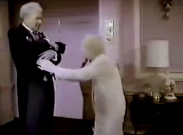 The Nutt House - Pilot - Mrs. Nutt Cloris Leachman taking black cat from Reginald Harvey Korman