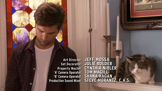 Parks and Recreation - Camping - Ben Adam Scott with tabby and white cat