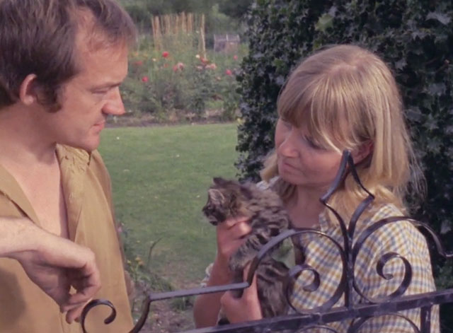 Play for Today - Penda's Fen - Mrs. Arne Jennie Heslewood holding longhair tabby kitten with Ian Hogg