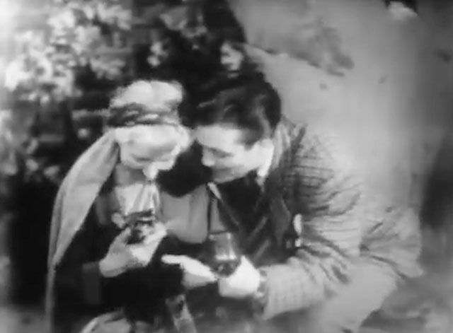 The Quatermass Experiment - Contact Has Been Established - Miss Wilde Katie Johnson holding longhair tabby cat Henry in her lap while being interviewed by BBC reporter Pat McGrath