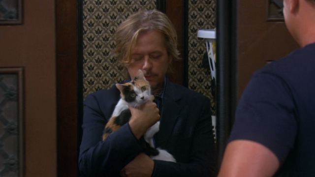 Rules of Engagement - Dirty Talk Russell David Spade holding calico cat in elevator