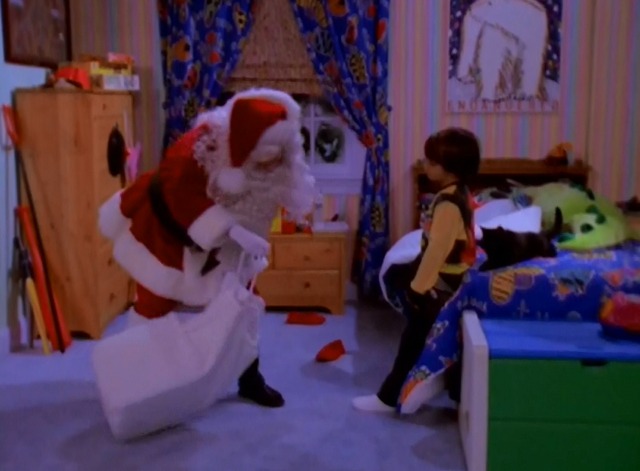 Sabrina the Teenage Witch - A Girl and Her Cat - black cat Salem on bed with Sabrina Melissa Joan Hart as Santa and Rex Seth Adkins