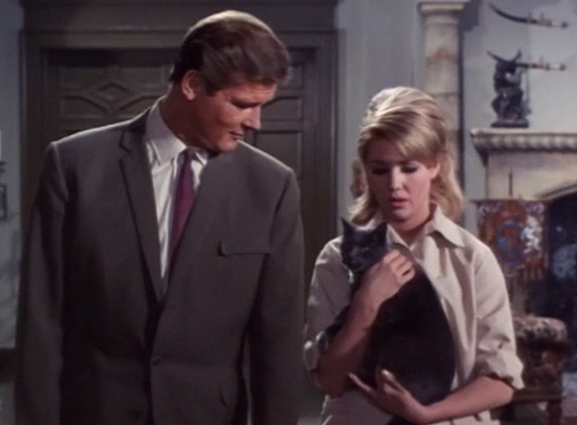 The Saint - The House on Dragon's Rock - Carmen Annette Andre holding gray cat with Simon Templar Roger Moore