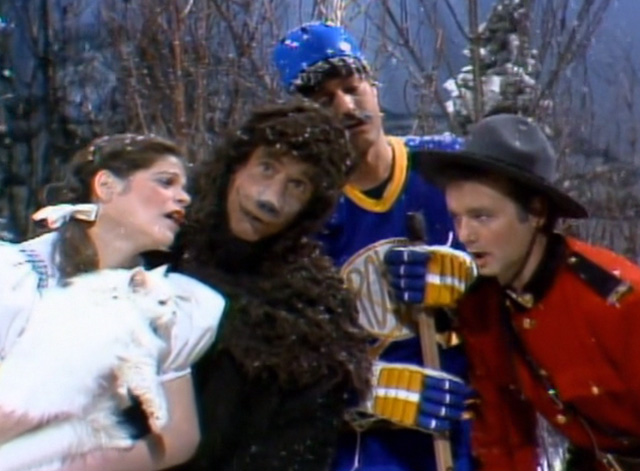 Saturday Night Live - The Incredible Man - Jennifer Gilda Radner and white Persian cat Tinky with Mountie Bill Murray hockey player Peter Aykroyd and sleepy bear Elliot Gould