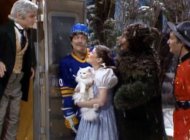 Saturday Night Live - The Incredible Man - Jennifer Gilda Radner and white Persian cat Tinky with Mountie Bill Murray hockey player Peter Aykroyd sleepy bear Elliot Gould and Harry Shearer