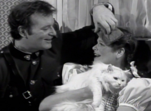Saturday Night Live - The Incredible Man - Jennifer Gilda Radner sitting on bed white Persian cat Tinky and Mountie Bill Murray