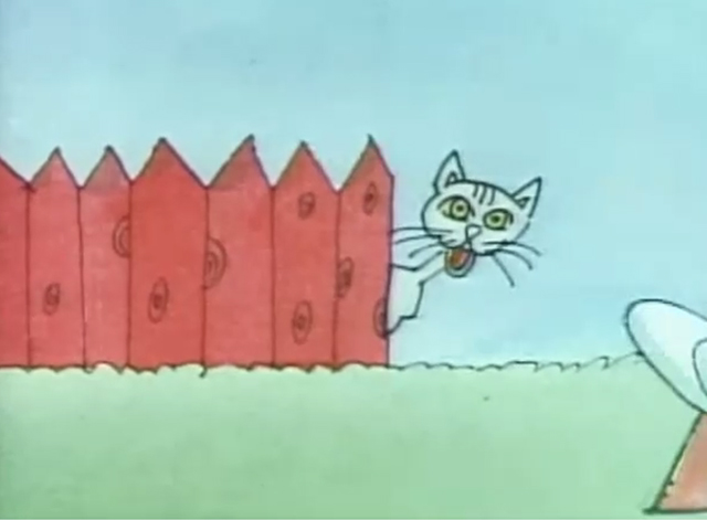 Sesame Street - Cat Hears Squeaking - white cat looking around fence shocked