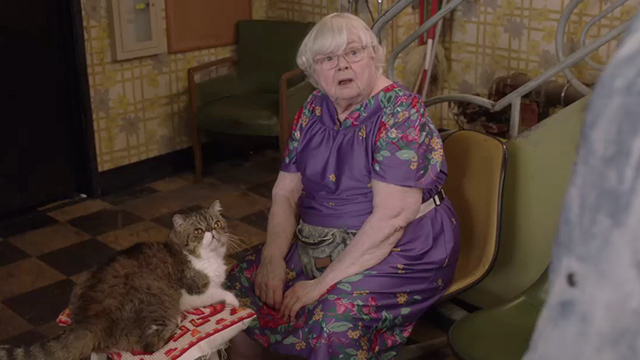 Shameless - The Defenestration of Frank - Etta June Squibb sitting with exotic shorthair McMahon