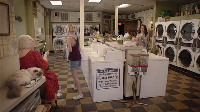 Shameless - Own Your Sh*t - Fiona Emmy Rossum and Etta June Squibb in laundromat with numerous cats