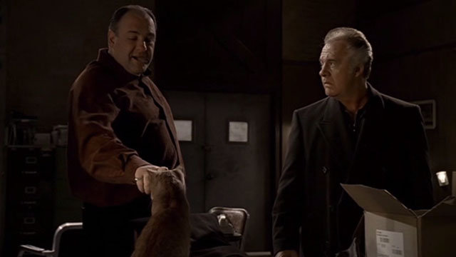 The Sopranos - Made in America - Tony Soprano James Gandolfini reaching out to orange tabby cat with Paulie Tony Sirico