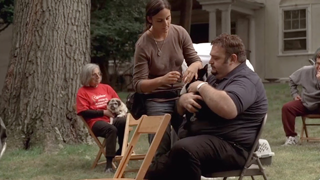 The Sopranos - Remember When - woman giving man tuxedo cat
