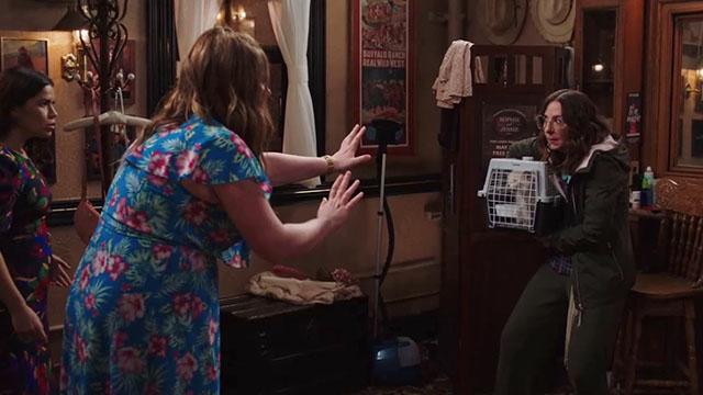 Superstore - Sandra's Wedding - Carol Irene White holding cat Biscuit carrier with Dina Lauren Ash and Amy America Ferrera