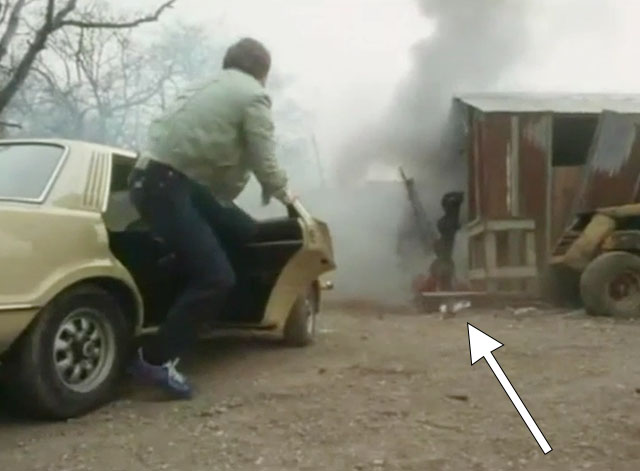 Target - The Run - tabby and white cat running away from exploding building