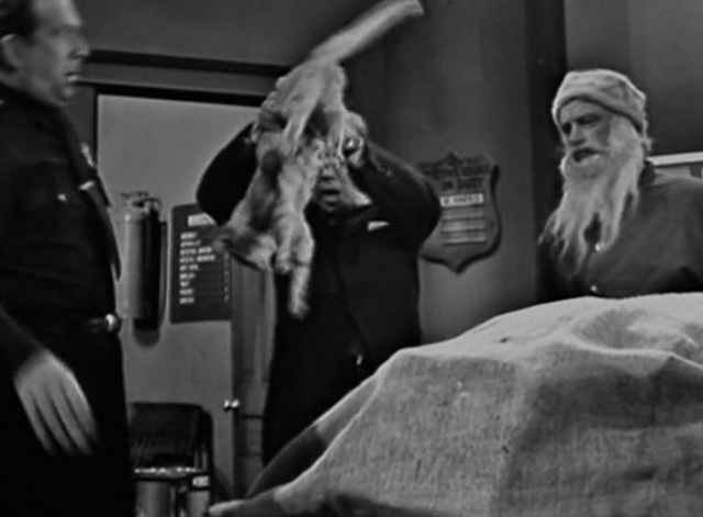 The Twilight Zone - The Night of the Meek - tabby cat being pulled out of bag by Mr. Dundee John Fiedler with Henry Art Carney and Flaherty Robert P. Lieb