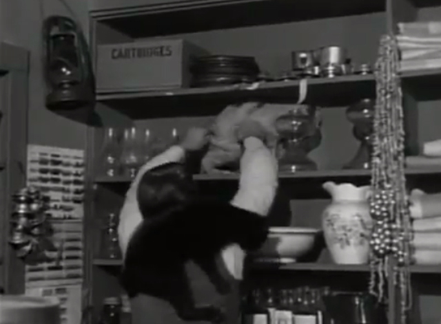 The Westerner - The Courting of Libby - black cat jumping on clerk