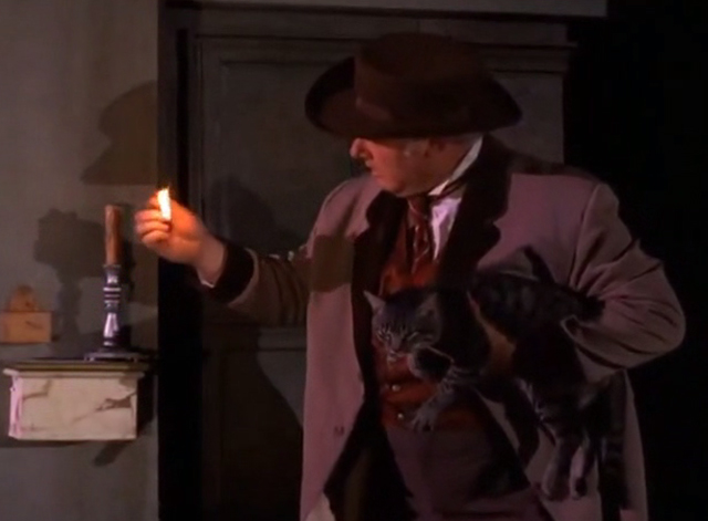 The Wild Wild West - The Night of the Sabatini Death - Ned Alan Hale Jr. lights candle while holding tabby cat at crypt
