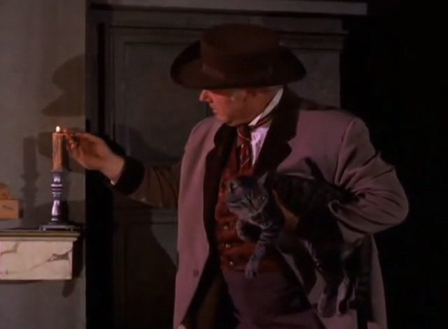 The Wild Wild West - The Night of the Sabatini Death - Ned Alan Hale Jr. lights candle while holding tabby cat at crypt