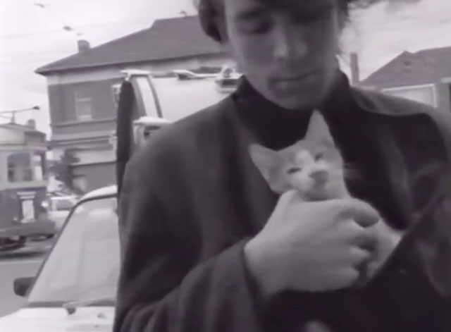 City Flat - Boom Crash Opera - Richard Pleasance holding tabby and white kitten