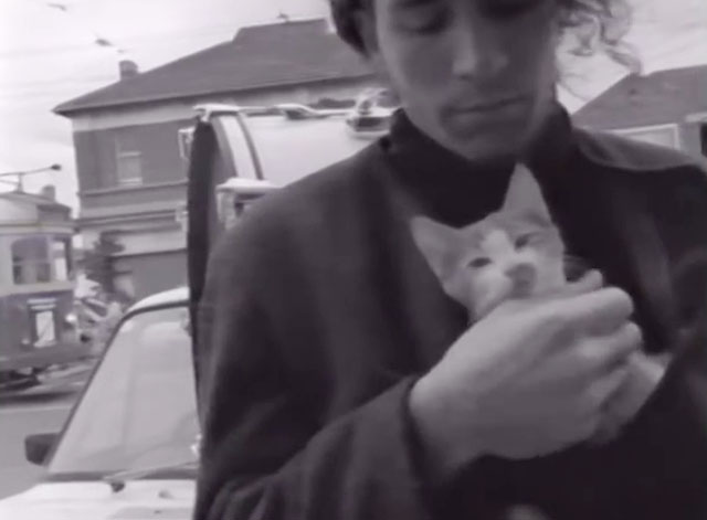 City Flat - Boom Crash Opera - Richard Pleasance holding tabby and white kitten