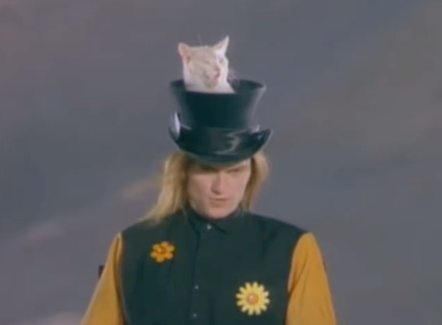 The King is Half Undressed - Jellyfish - white cat poking out of Marvin Andrew Sturmer's top hat
