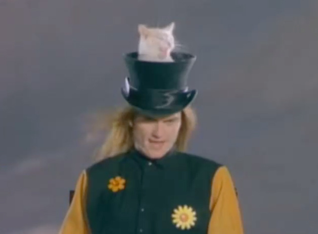 The King is Half Undressed - Jellyfish - white cat poking out of Marvin Andrew Sturmer's top hat