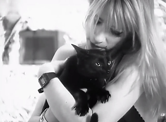 Kool Thing - Sonic Youth - Kim Gordon holding black cat